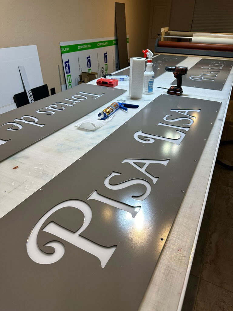 Sedona-Sign-Company-Pisa-Lisa-Water-jet-cut-metal-sign